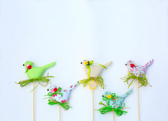 Textile spring birds. Decorative toys of handwork. Easter decorations