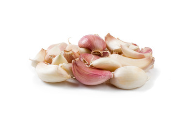 garlic cloves heap isolated on white background. front view