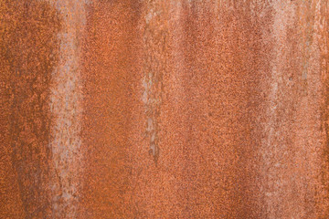 brown rusty iron sheet with gray spots and dots. rough surface texture
