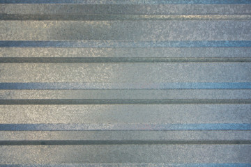gray blue metal sheet with horizontal lines. rough surface texture