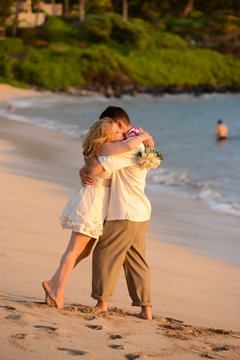 Couple embracing on a tropical beach 