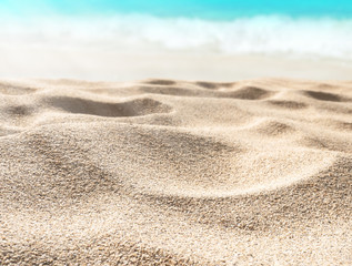 Fototapeta na wymiar Beach and turquoise blue sea blurred background.
