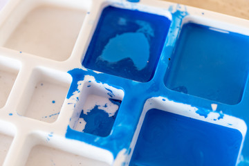 Close up of different color oil paint, Patterns or backgrounds of various colors, colors on the fabric.