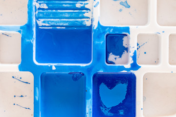 Close up of different color oil paint, Patterns or backgrounds of various colors, colors on the fabric.