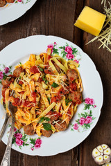 homemade pasta with meatballs in tomato sauce