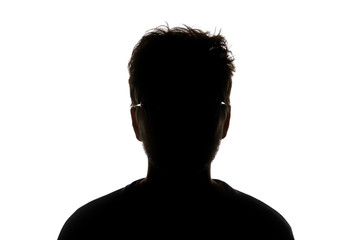 Silhouette of man in glasses looking at camera isolated on white