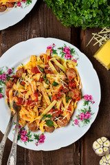homemade pasta with meatballs in tomato sauce