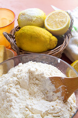 lemons in a wicker basket are on the table