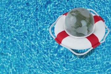 Life preserver floating in a clear pool water