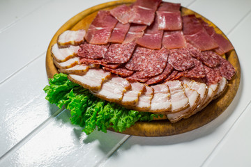 Meat plate set with salami, bacon, hamon
