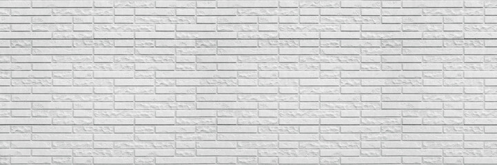 Abstract white brick wall texture background. Horizontal panoramic view of masonry brick wall for interior design.