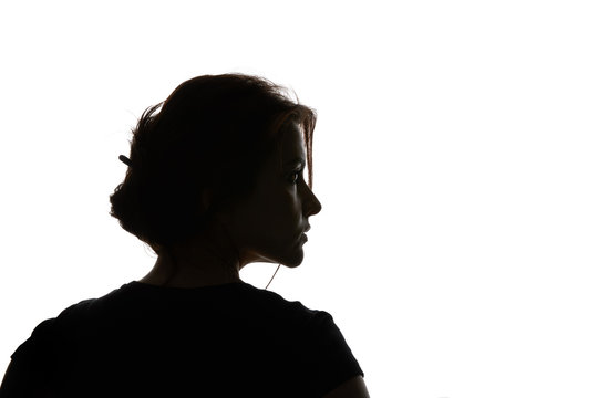 Silhouette of pensive woman looking away isolated on white