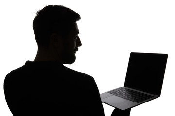 Silhouette of man holding laptop with blank screen isolated on white