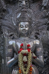 Silver guardian is holding flowers, Silver temple Wat Sri Suphan In Chiang Mai Thailand 