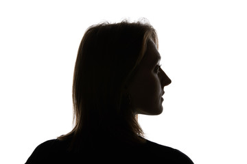 Silhouette of young woman looking away isolated on white