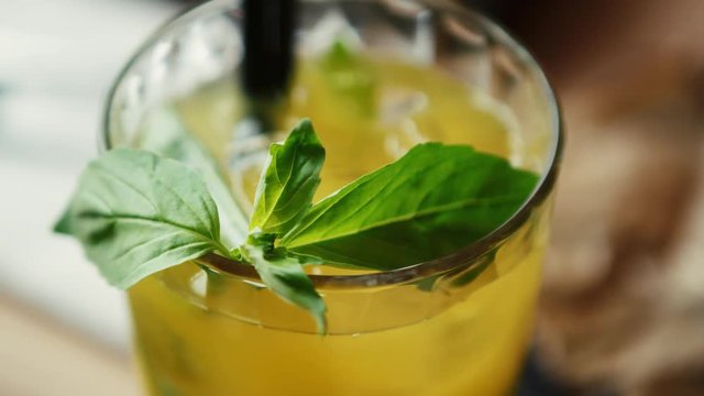 Awesome fresh summer long drink with mint leaves & lime slice served with white rum,vodka & ice in high bocal glass.Enjoy refreshing longdrinks at the bar.Restaurant or cafe alcohol menu