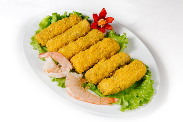 Traditional oriental cuisine of  Vietnam. Tempura shrimp, sole fish and seafood breaded with salad