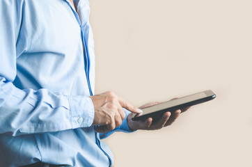 businessman using mobile phone touch screen in office with hands typing smart phone texting messaging lifestyle working app device technology internet social data online concept vintage style.