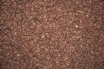 Large piece of dark corkboard suitable for use as background texture