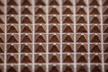 board for beating meat texture, wooden triangles, interesting convex texture, many triangles