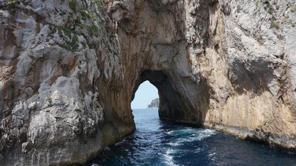 Rock cliffs in the sea around the island of capri, Faraglioni off Capri Italy