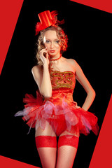 Sexy burlesque dancer stripper posing in red corset and red hat with curly hair and beautiful legs...