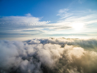 Wind power generator before sunrise sunset ，Wind power generation in the sea of clouds