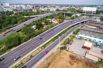City traffic road with modern building aerial view
