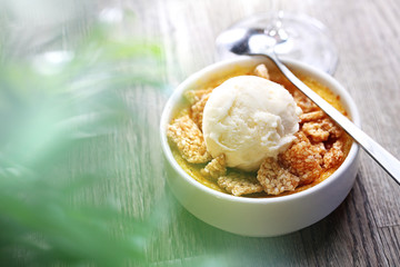 Cream brulee with vanilla ice cream and sesame in caramel.