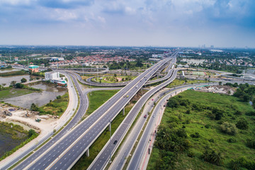 City traffic road with modern building aerial view
