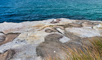 Rocks above the ocean