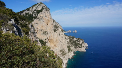 Fototapeta premium View from a cliff on the island of Capri, Italy, and rocks in the sea