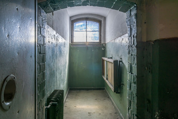 Cell interior at abandoned prison jail.