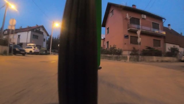 957_08 Bicycle Ride Wheel View At Night Through City Long Time Lapse