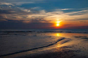 Golden sunset over a beach of the north sea