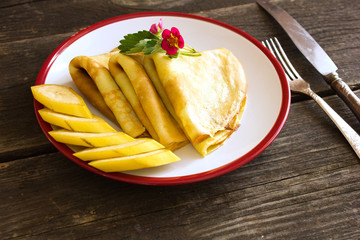 Tasty crepes with caviar. French crepes, russian or ukrainian on white background. Maslenitsa holiday food