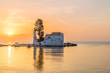 Obraz premium Vlacherna Monastery at sunrise on Corfu island