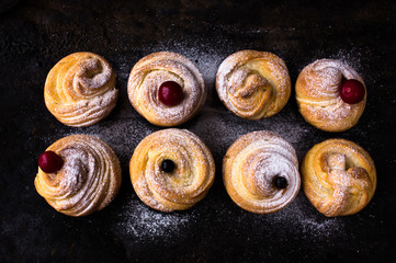 Modern fashionable pastries - scones cruffins (puffmaffin) a mixture of a croissant and maffin