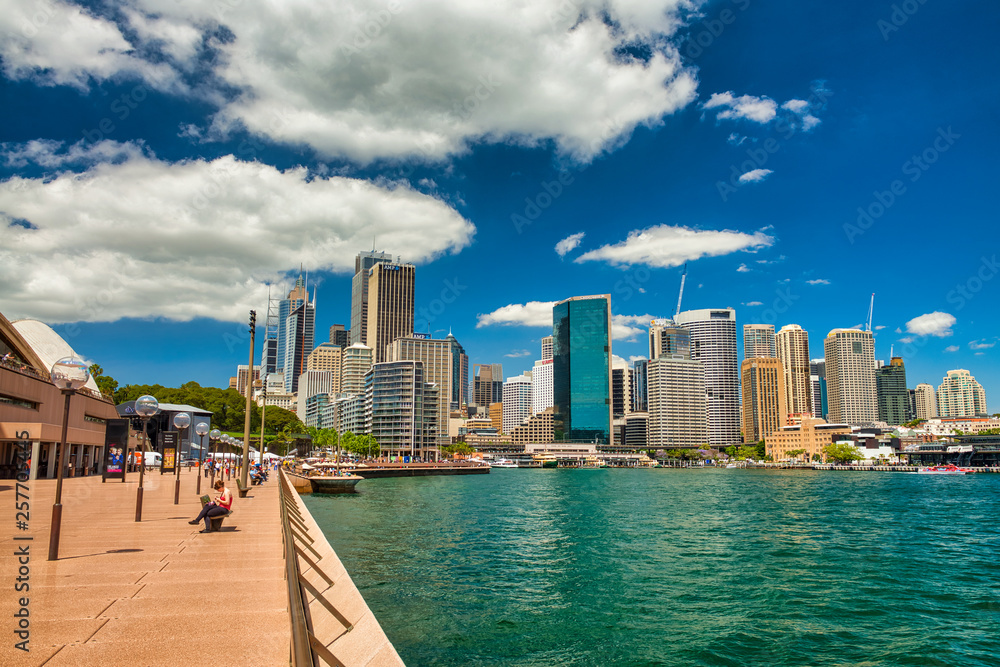 Sticker sydney - october 2015: city buildings on a beautiful sunny day. the city attracts 20 million people 