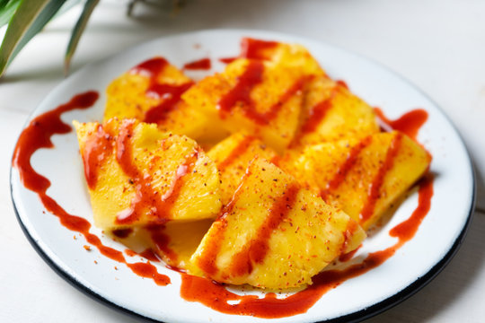 Mexican pineapple  with chili powder and chamoy