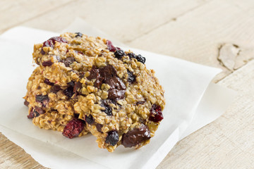 Cookies made with oatmeal, chocolate and dried fruits