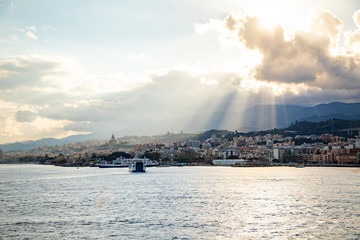 Beautiful view of cityscape and harbor of Messina from ferry, Sicily, Italy