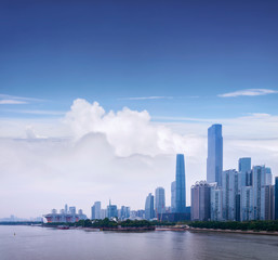 Cityscape of Guangzhou with skyscrapers and modern buildings in Zhujiang business center district, China.