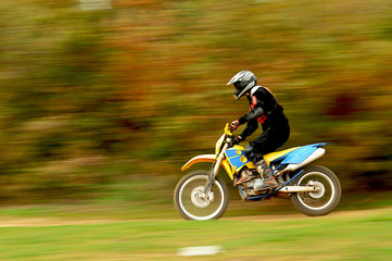 Motocross Action in Autumn
