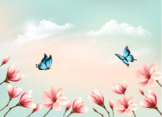 Nature spring background with a pink magnolia branches on blue sky. Vector.