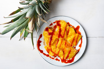 Mexican pineapple  with chili powder and chamoy