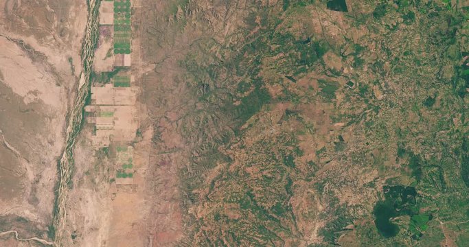 Very high-altitude overflight aerial of Masvingo Province, Zimbabwe. Clip loops and is reversible. Elements of this image furnished by NASA