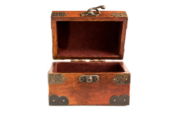 Wooden old treasure chest for jewelry on a white background. Isolated. Front view