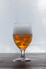 glass of whiskey and smoke