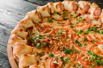 tasty unusual pizza with sausage in a side